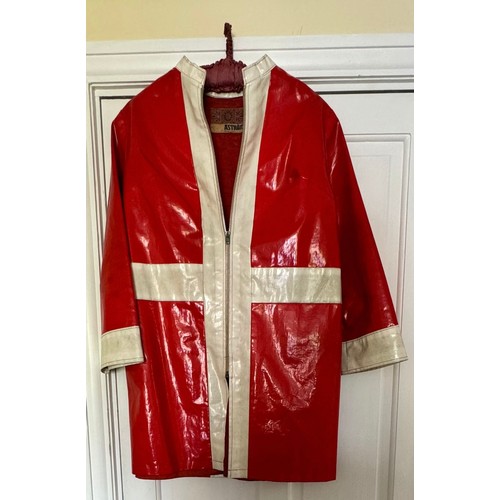 878 - A 1960's Aström design London red and white PVC coat.  87cm l x 49cm armpit to armpit.