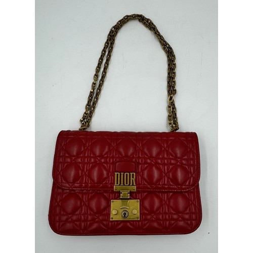 880 - A Christian Dior Cannage 'Dior Addict' leather bag in red. Gold chain and gold fittings. Suede inter... 