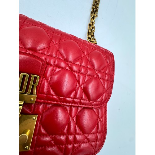 880 - A Christian Dior Cannage 'Dior Addict' leather bag in red. Gold chain and gold fittings. Suede inter... 