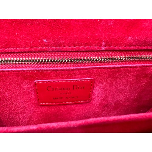 880 - A Christian Dior Cannage 'Dior Addict' leather bag in red. Gold chain and gold fittings. Suede inter... 