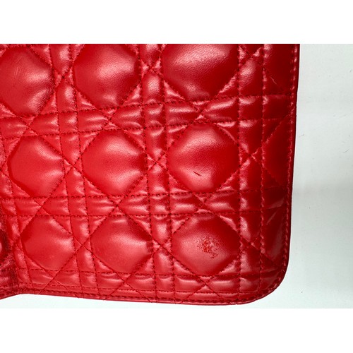 880 - A Christian Dior Cannage 'Dior Addict' leather bag in red. Gold chain and gold fittings. Suede inter... 