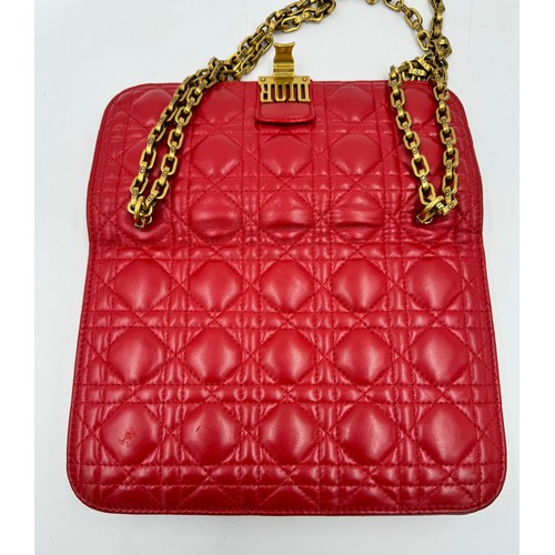 880 - A Christian Dior Cannage 'Dior Addict' leather bag in red. Gold chain and gold fittings. Suede inter... 