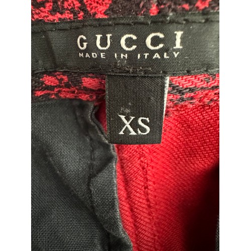 881 - Red Gucci jeans size XS, and red leather Gucci belt size 70 together with a DéjàVu jacket size small... 