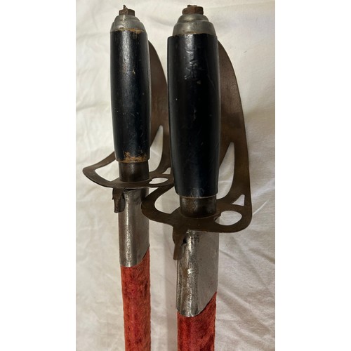 922 - Two Indian dress swords marked Golden Temple made in India, in velvet sheaths both measuring 97cm.