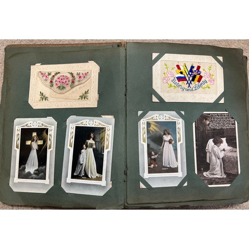 916 - An Edwardian postcard album and contents to include a quantity of WW1 silk embroidered examples, WW1... 