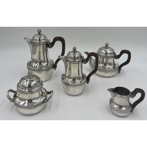 805 - A five piece French silver tea-service with wooden handles, maker Risler and Carré Paris. Total weig... 