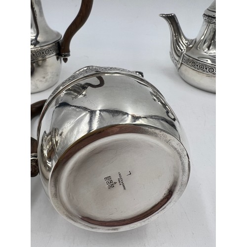 805 - A five piece French silver tea-service with wooden handles, maker Risler and Carré Paris. Total weig... 