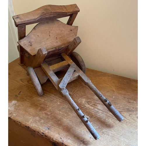 1212 - A tipping wooden farm cart, early 20thC, measuring 27cm w x 59cm l x 26cm h. Victorian carved wooden... 