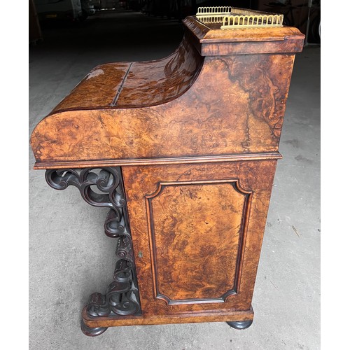 46 - A good quality burr walnut Davenport desk with piano front and brass gallery to top, four drawers to... 