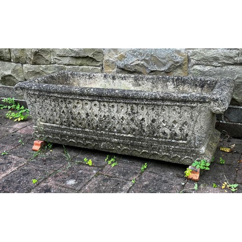 25 - A reconstituted stone garden trough. Approximately 45cm d x 92cm w.