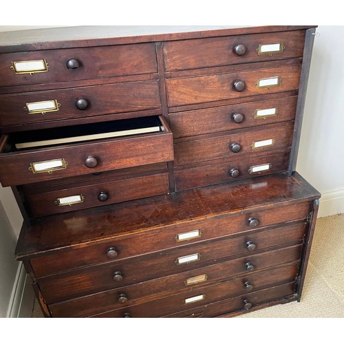 48 - A 19thC mahogany collectors cabinet with wooden knobs. Ten drawers to top over five long drawers to ... 