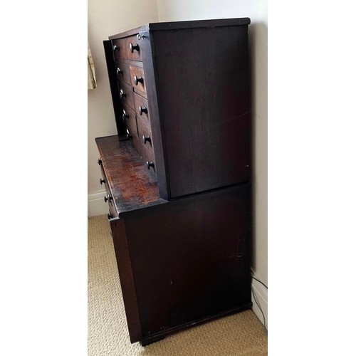 48 - A 19thC mahogany collectors cabinet with wooden knobs. Ten drawers to top over five long drawers to ... 