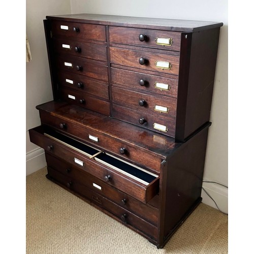 48 - A 19thC mahogany collectors cabinet with wooden knobs. Ten drawers to top over five long drawers to ... 