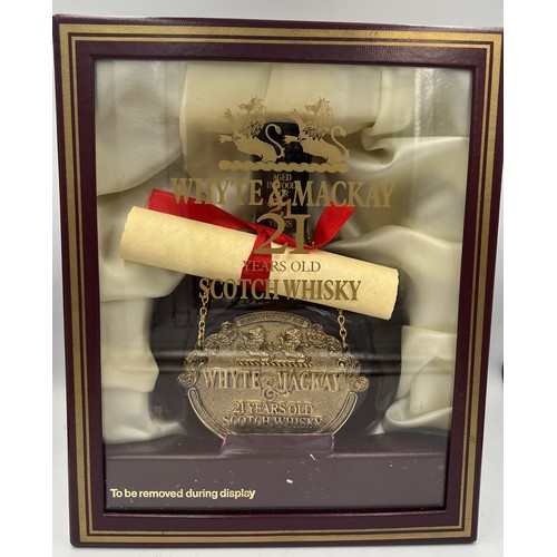 1231 - A 75cl bottle of Whyte & Mackay 21 year old scotch whisky in original presentation case with scroll.