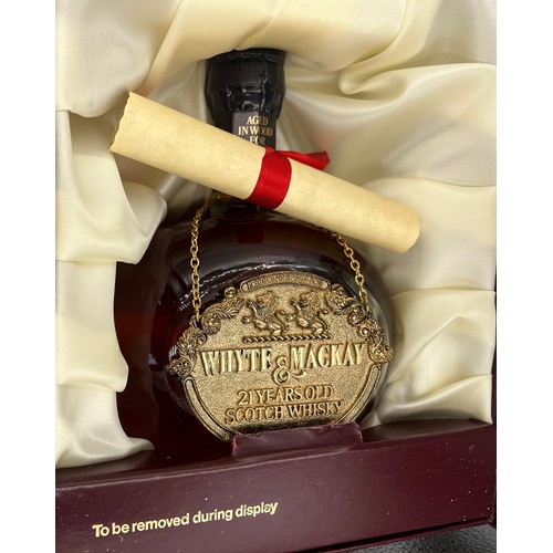 1231 - A 75cl bottle of Whyte & Mackay 21 year old scotch whisky in original presentation case with scroll.