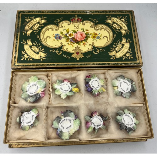 402 - Eight boxed Royal Crown Derby posies. Box 10cm x 20cm.