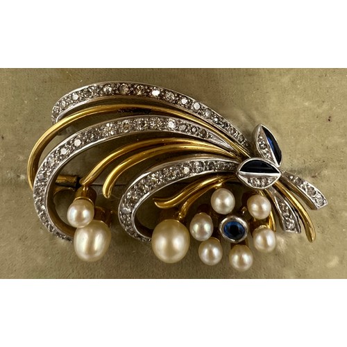 599 - An 18 carat white and yellow gold brooch set with diamonds, pearls and sapphires. 4.5cm x 2.5cm. In ... 