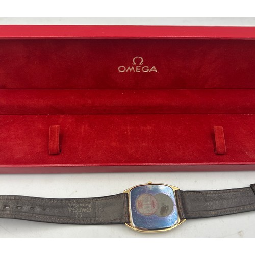 723 - A gentleman’s Omega De Ville wristwatch with square face and leather strap in original box.