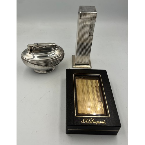 1328 - Three lighters to include DuPont gold plated lighter in original box, Lord De Luxe column silver pla... 