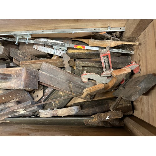 1329 - A quantity of vintage tools to include 2 drilling machines and a pine chest of planes etc.