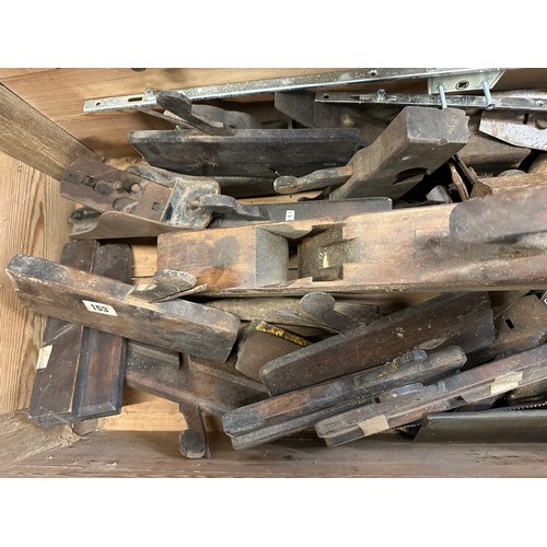 1329 - A quantity of vintage tools to include 2 drilling machines and a pine chest of planes etc.