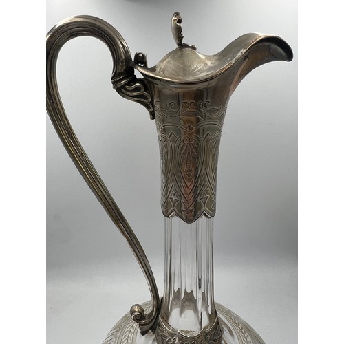 808 - A silver mounted etched glass claret jug. 27cm h. London 1860, maker Thomas Smily.