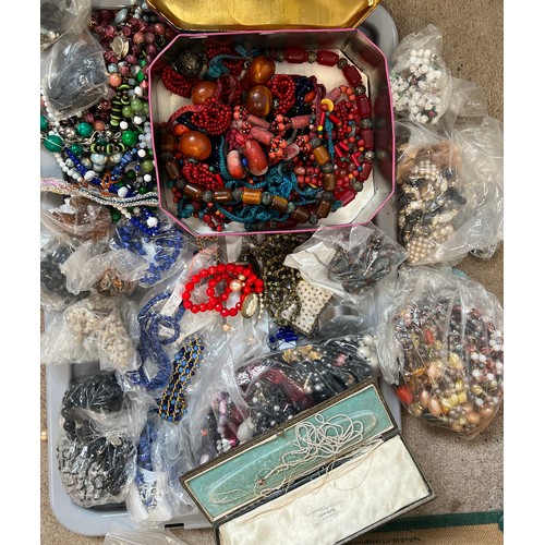 576 - A quantity of mainly loose beads to include seed pearl necklace etc.