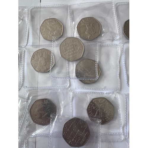 735 - A quantity of fifty pence pieces to include WWF, Battle of Hastings, Beatrix Potter, 2012 Olympic et... 