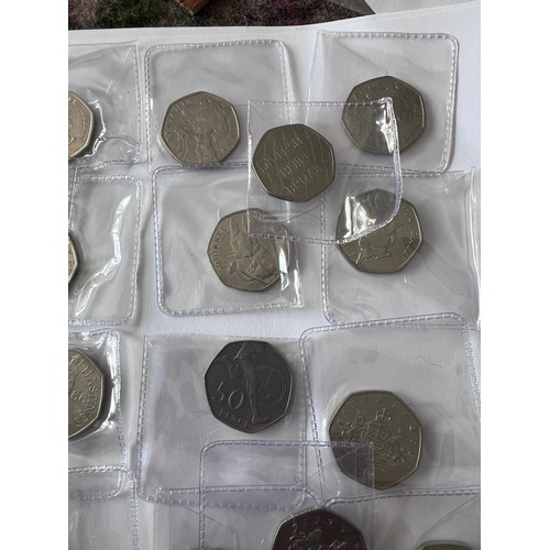 735 - A quantity of fifty pence pieces to include WWF, Battle of Hastings, Beatrix Potter, 2012 Olympic et... 