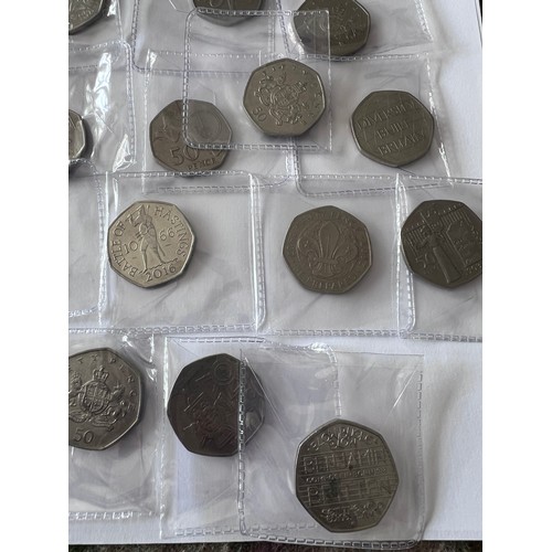 735 - A quantity of fifty pence pieces to include WWF, Battle of Hastings, Beatrix Potter, 2012 Olympic et... 