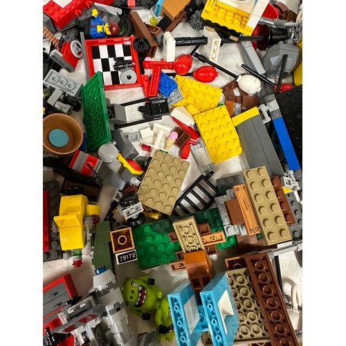 1211 - Lego, an unboxed quantity of loose items to include Star Wars Millennium Falcon, boat, helicopter, j... 