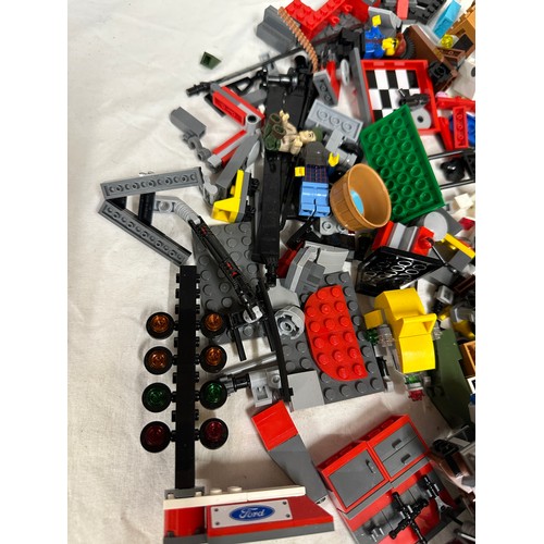 1211 - Lego, an unboxed quantity of loose items to include Star Wars Millennium Falcon, boat, helicopter, j... 