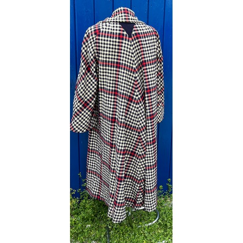 839 - A Red, blue and white wool checked coat, label for Mangone New York Montreal.