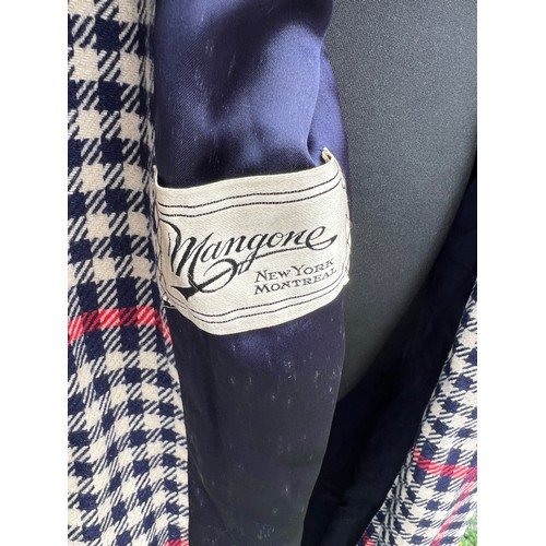 839 - A Red, blue and white wool checked coat, label for Mangone New York Montreal.