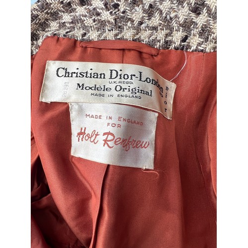 840 - A 1960’s Christian Dior wool coat with leather buttons and belt. Label marks made in England for Hol... 