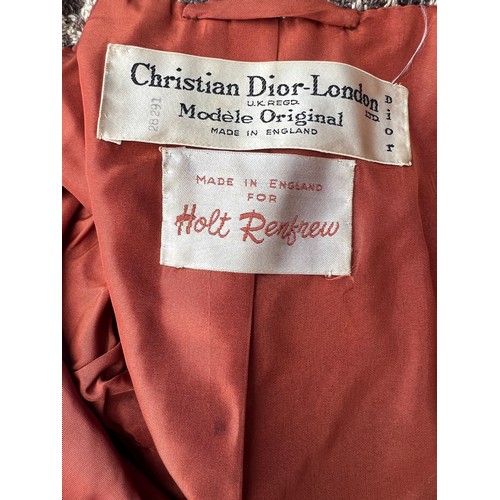 840 - A 1960’s Christian Dior wool coat with leather buttons and belt. Label marks made in England for Hol... 