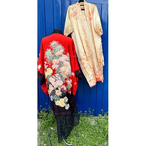 841 - Two silk kimonos one with lace addition to base.