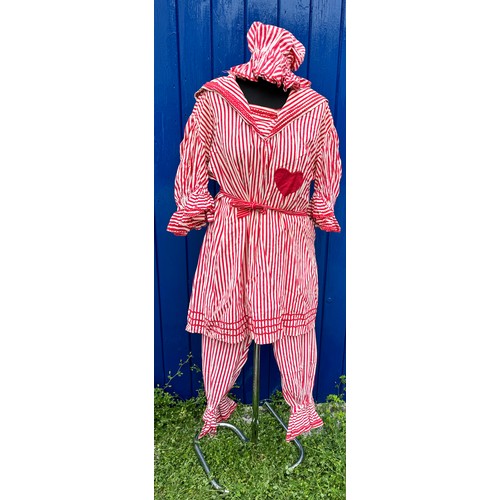 844 - An early 20thC red and white striped bathing costume comprising of top, bloomers, bonnet and belt.