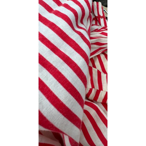 844 - An early 20thC red and white striped bathing costume comprising of top, bloomers, bonnet and belt.