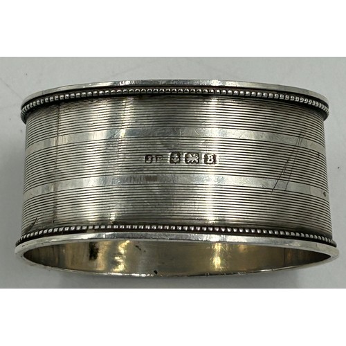 807 - Hallmarked silver to include a Yard of Lead pencil in original box, 3 x napkin rings various dates a... 