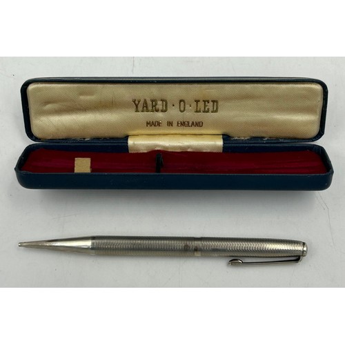 807 - Hallmarked silver to include a Yard of Lead pencil in original box, 3 x napkin rings various dates a... 