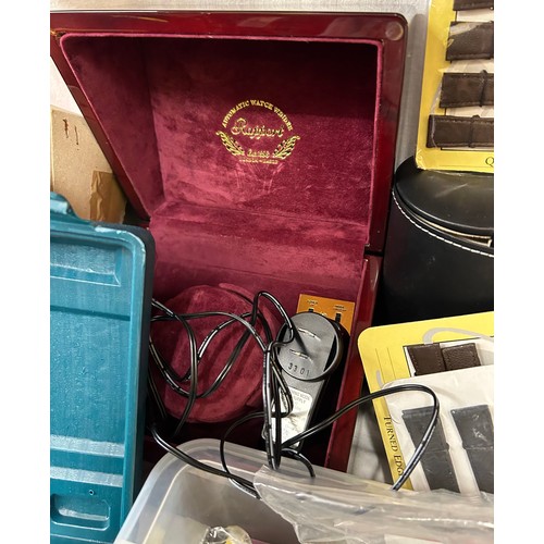 730 - A large quantity of watch repair related items comprising: a selection of leather and stainless watc... 