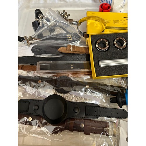 730 - A large quantity of watch repair related items comprising: a selection of leather and stainless watc... 