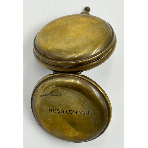 731 - Two pocket barometers, one Victorian gilt Pillischer Optician,  88 New Bond Street, London the other... 