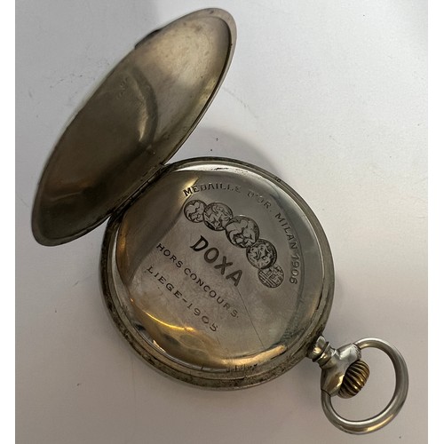 696 - An erotic Doxa pocket watch. 5.5cm d.