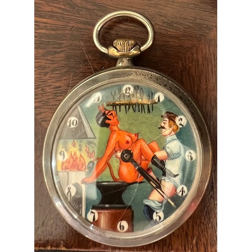 697 - An erotic pocket watch 5cm d.