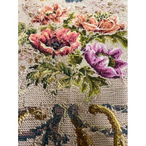 828 - Two vintage tapestries of classical floral designs. 56 x 56cm and approx. 63 x 52cm. Unframed.