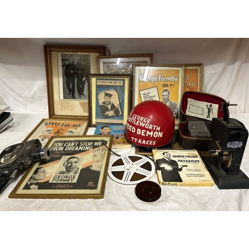 1338 - A collection of George Formby memorabilia to include a framed autograph along with Harry Marsh 1943,... 