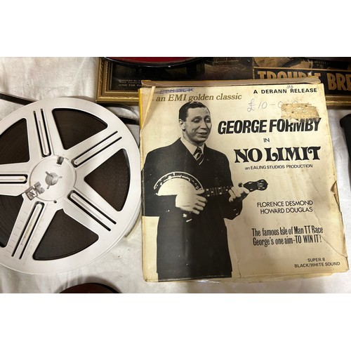 1338 - A collection of George Formby memorabilia to include a framed autograph along with Harry Marsh 1943,... 