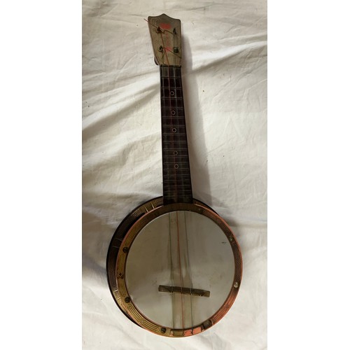 980 - Three ukulele banjos to include a rosewood made in the G.D.R. and a Melody Maker Selcol, Made in Eng... 